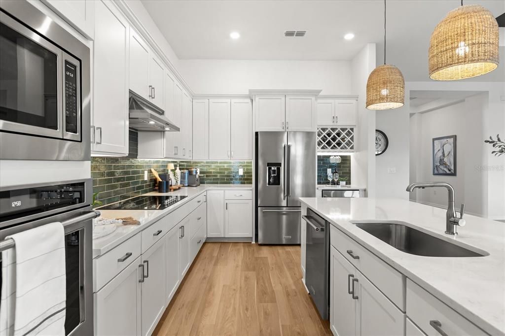 Interior, Kitchen, Pendant Lights, Recessed Lighting, Stainless Steel Appliances, Wood Texture Flooring