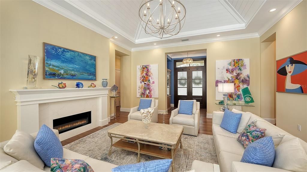 Chandelier, Fireplace, Interior, Living room, Recessed Lighting, Wood Texture Flooring