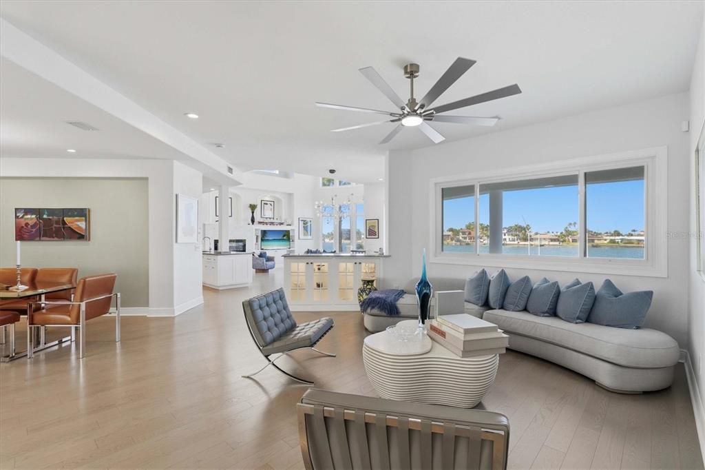 Dining room, Interior, Kitchen, Living room, Recessed Lighting, Water, Wood Texture Flooring