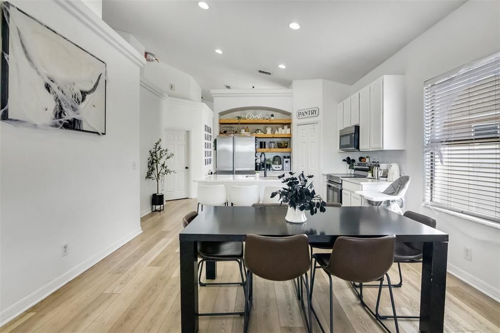 Dining room, Interior, Kitchen, Recessed Lighting, Stainless Steel Appliances, Wood Texture Flooring