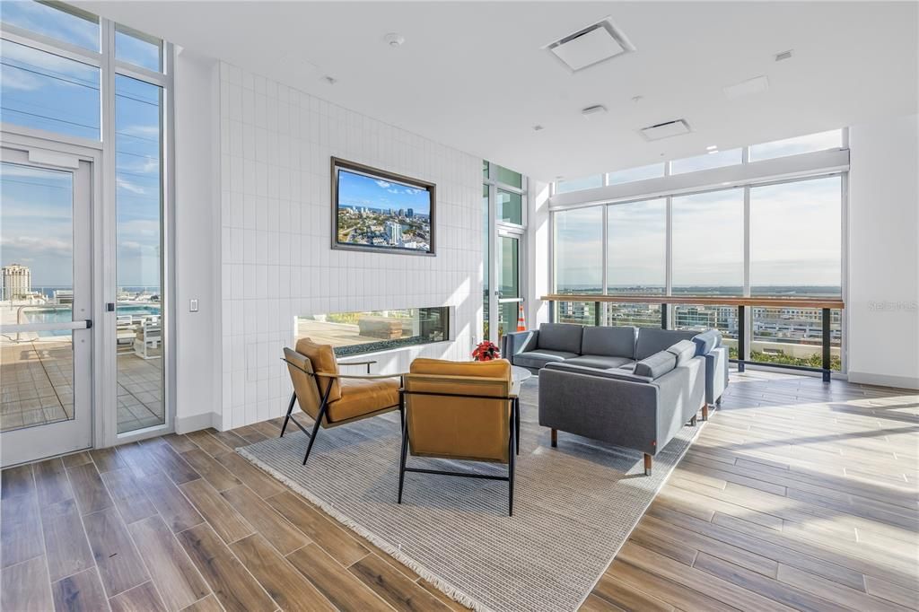 Fireplace, Interior, Living room, Recessed Lighting, Water, Wood Texture Flooring