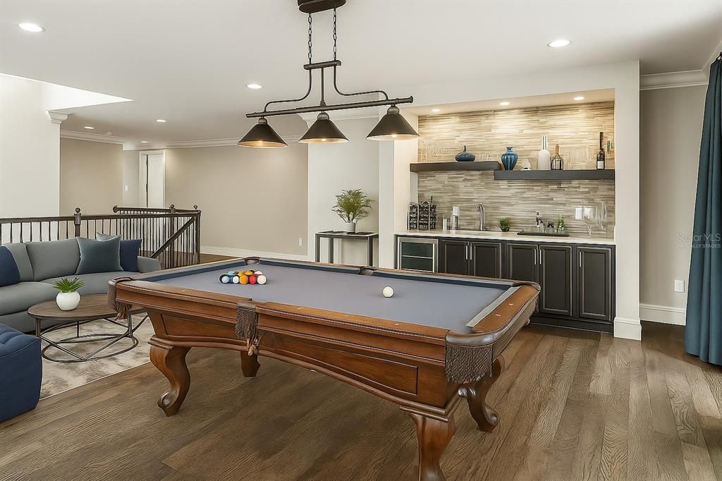 Billiard Table, Chandelier, Game Room, Interior, Pendant Lights, Recessed Lighting, Wood Texture Flooring