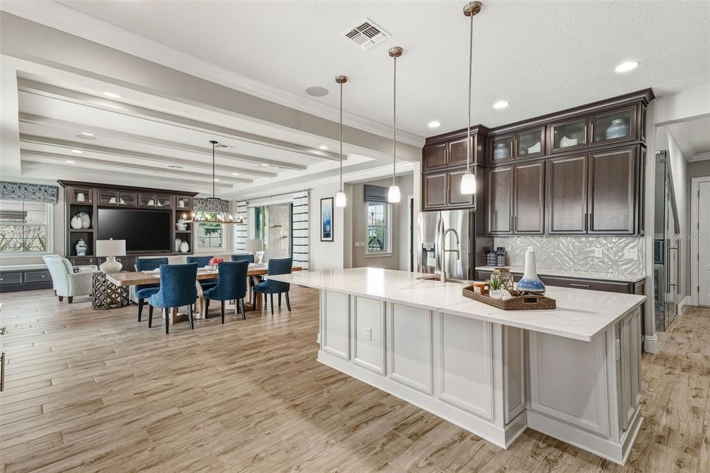 Chandelier, Dining room, Interior, Kitchen, Living room, Pendant Lights, Recessed Lighting, Wood Texture Flooring
