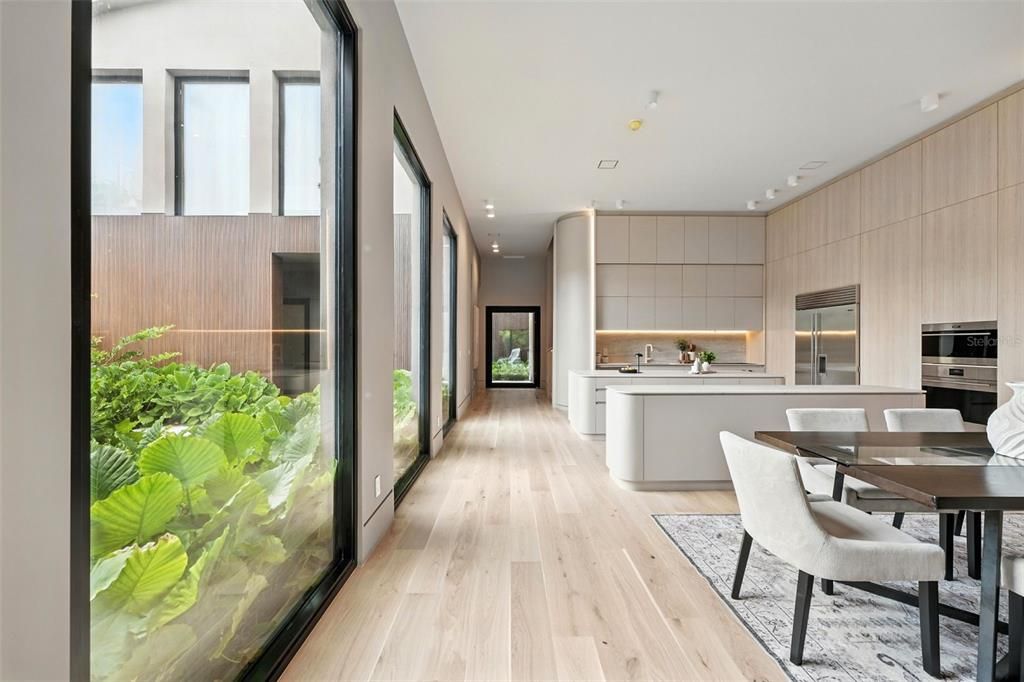 Dining room, Interior, Kitchen, Recessed Lighting, Stainless Steel Appliances, Wood Texture Flooring