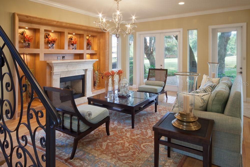 Chandelier, Fireplace, Interior, Living room, Recessed Lighting, Wood Texture Flooring