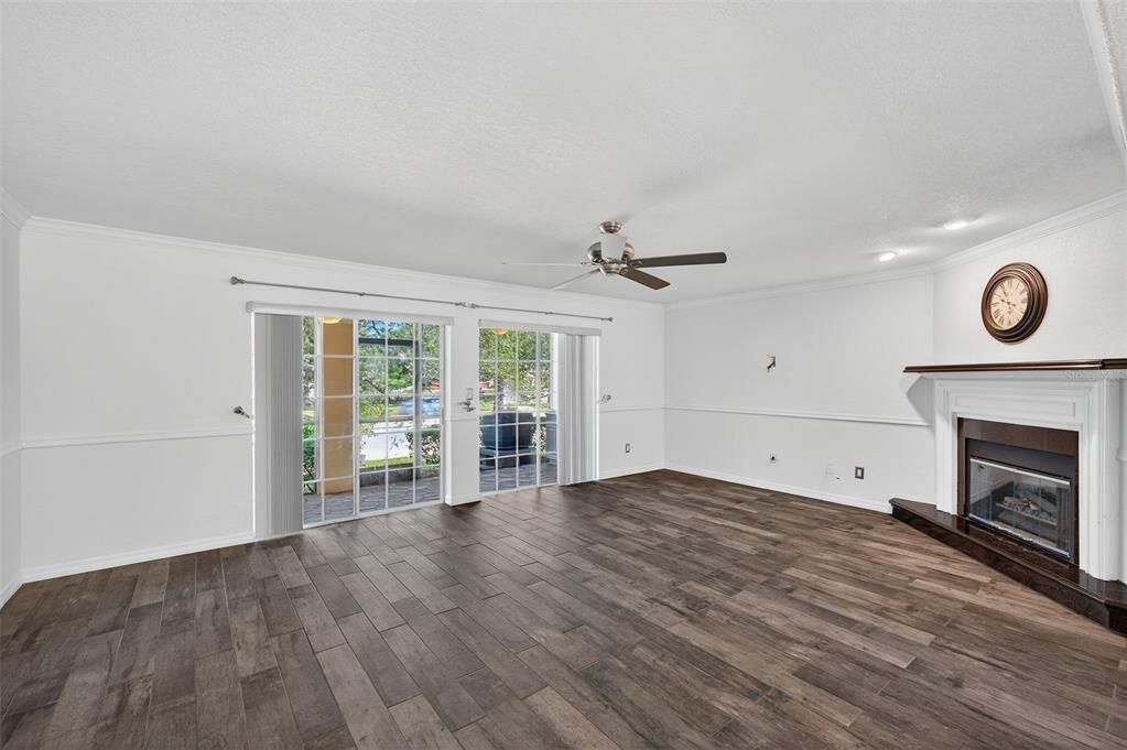 Empty room, Fireplace, Interior, Recessed Lighting, Wood Texture Flooring