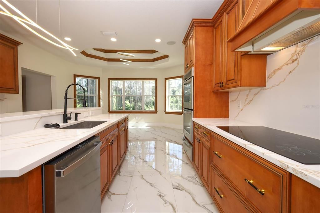 Interior, Kitchen, Marble, Marble Walls, Recessed Lighting, Stainless Steel Appliances