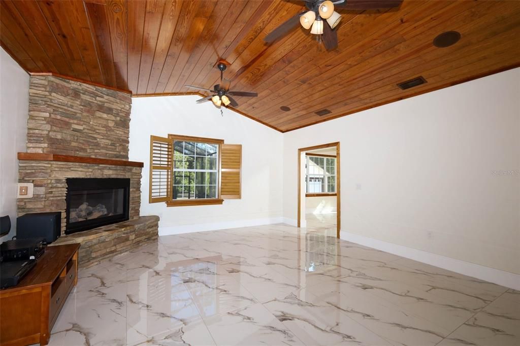 Empty room, Fireplace, Interior, Marble, Recessed Lighting, Wooden Ceilings