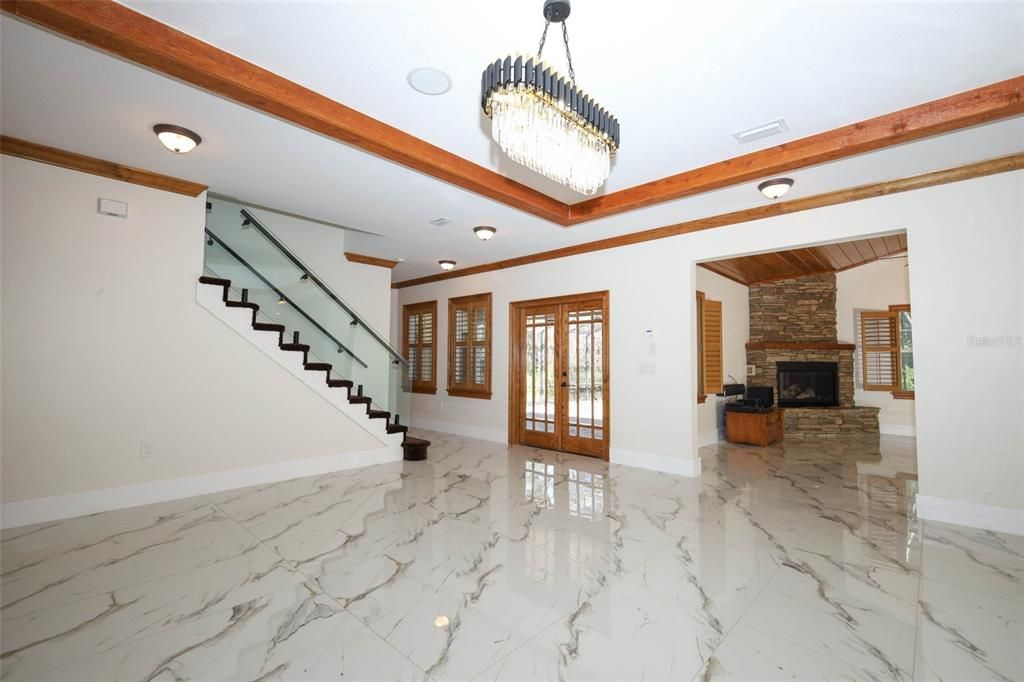 Chandelier, Empty room, Fireplace, Interior, Marble
