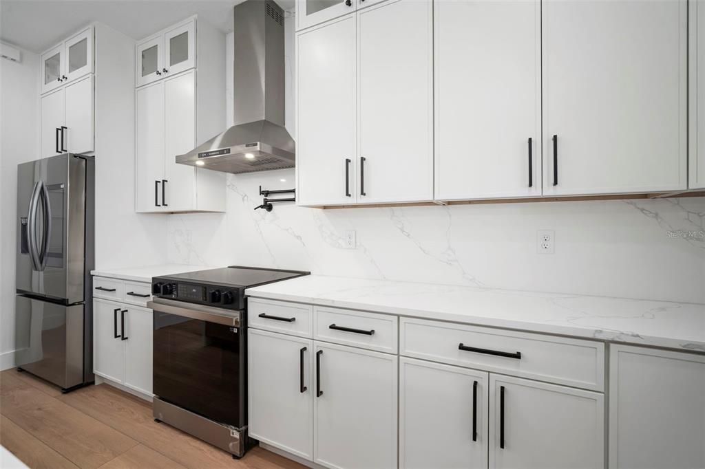 Interior, Kitchen, Marble Walls, Stainless Steel Appliances, Wood Texture Flooring