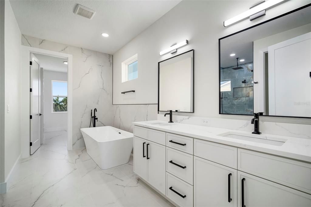 Bathroom, Dual Sink Vanities, Free Standing Baths, Interior, Marble, Marble Walls, Recessed Lighting