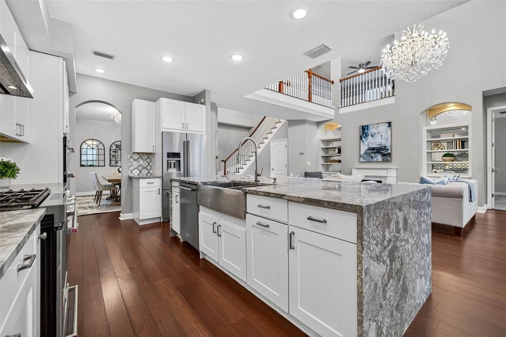 Chandelier, Dining room, Interior, Kitchen, Recessed Lighting, Stainless Steel Appliances, Wood Texture Flooring