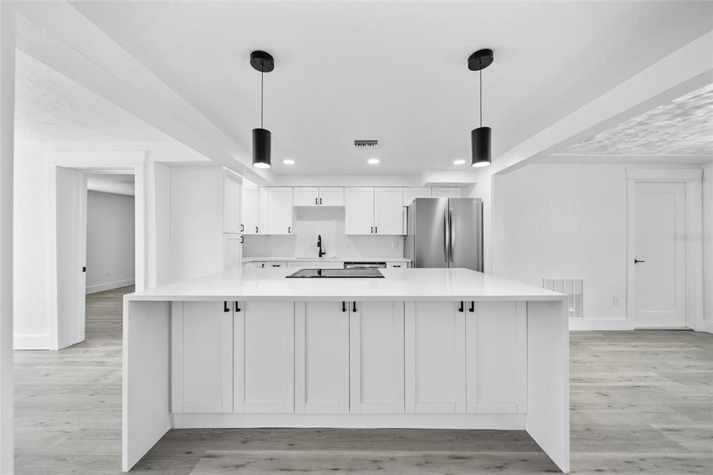 Interior, Kitchen, Pendant Lights, Recessed Lighting, Stainless Steel Appliances, Wood Texture Flooring