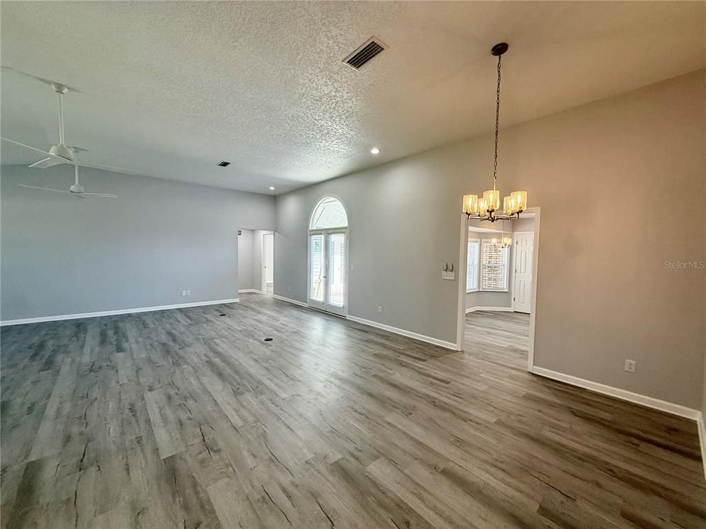 Chandelier, Empty room, Interior, Recessed Lighting, Wood Texture Flooring