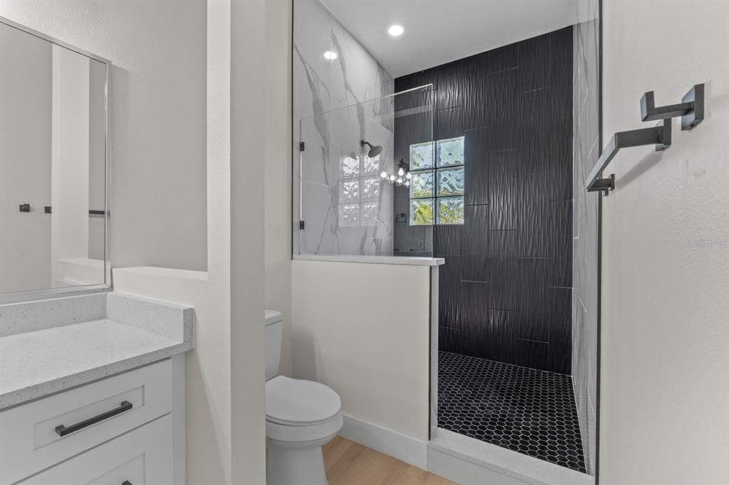 Bathroom, Glass Shower, Interior, Recessed Lighting, Wood Texture Flooring