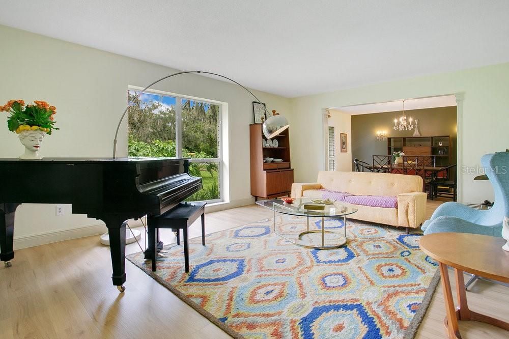 Chandelier, Dining room, Interior, Living room, Piano, Wood Texture Flooring