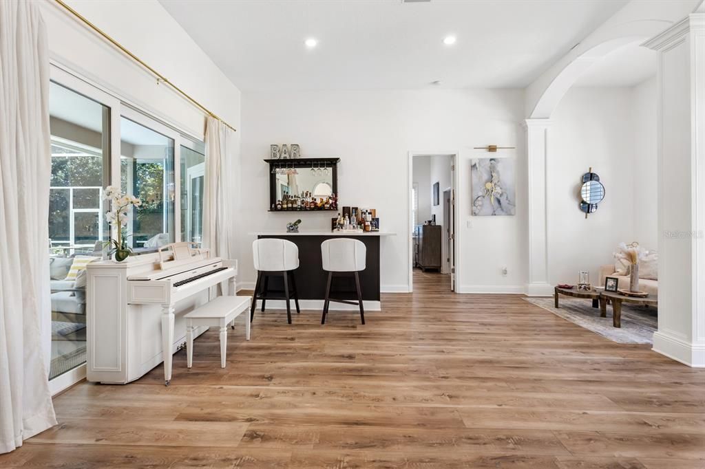 Dining room, Interior, Piano, Recessed Lighting, Wood Texture Flooring