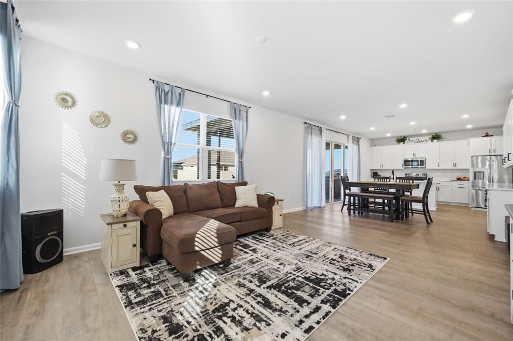 Dining room, Interior, Kitchen, Living room, Recessed Lighting, Stainless Steel Appliances, Wood Texture Flooring