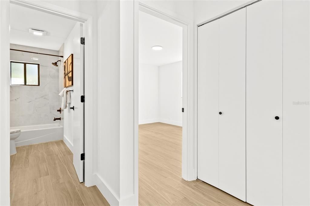 Bathroom, Interior, Marble Walls, Recessed Lighting, Wood Texture Flooring