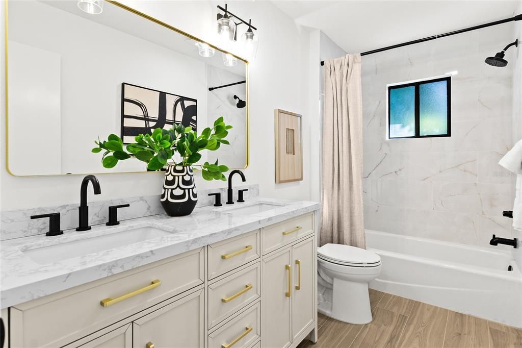 Bathroom, Dual Sink Vanities, Interior, Marble Walls, Wood Texture Flooring