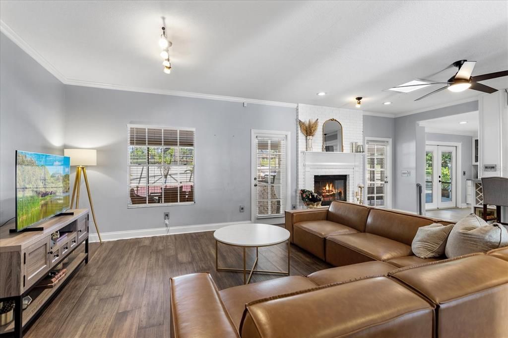 Fireplace, Interior, Living room, Recessed Lighting, Wood Texture Flooring