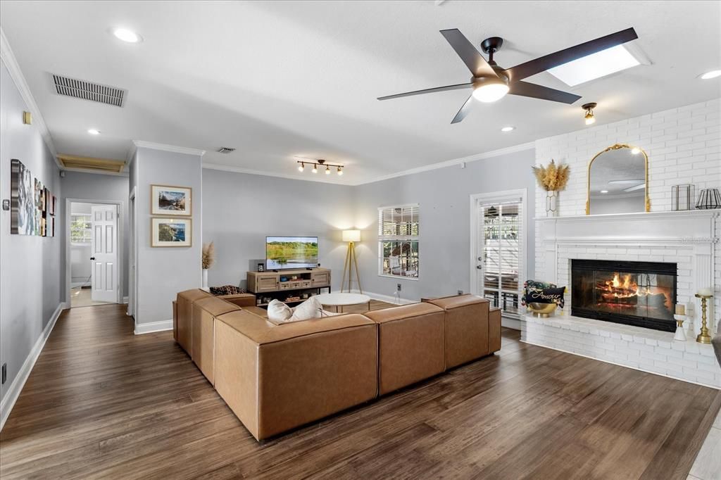 Fireplace, Interior, Living room, Recessed Lighting, Wood Texture Flooring