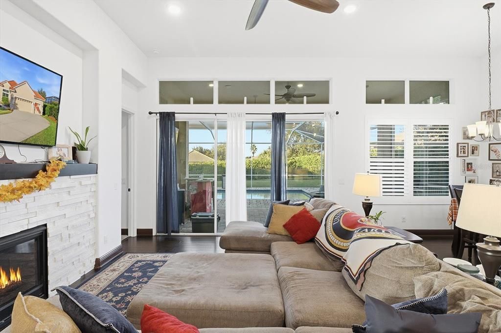 Fireplace, Interior, Living room, Recessed Lighting, Wood Texture Flooring