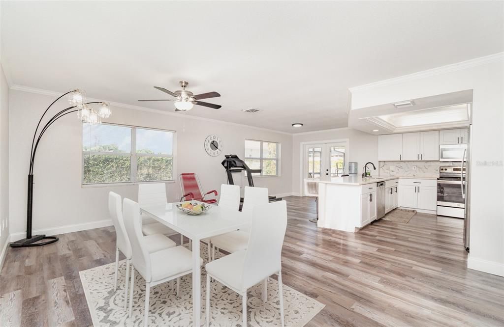 Dining room, Interior, Kitchen, Recessed Lighting, Stainless Steel Appliances, Wood Texture Flooring