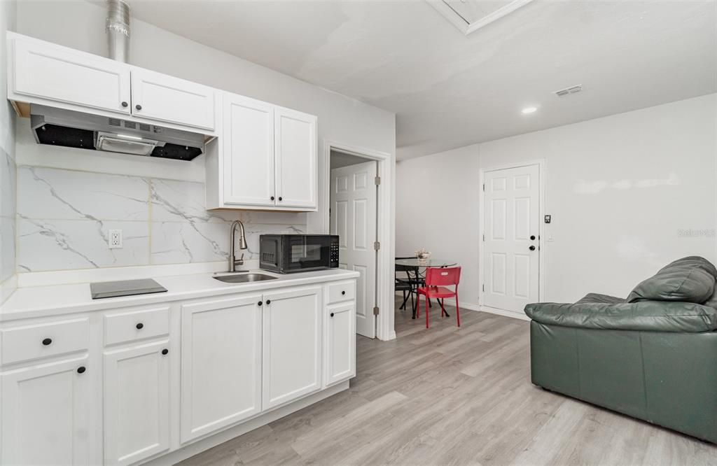 Dining room, Interior, Kitchen, Marble Walls, Recessed Lighting, Wood Texture Flooring