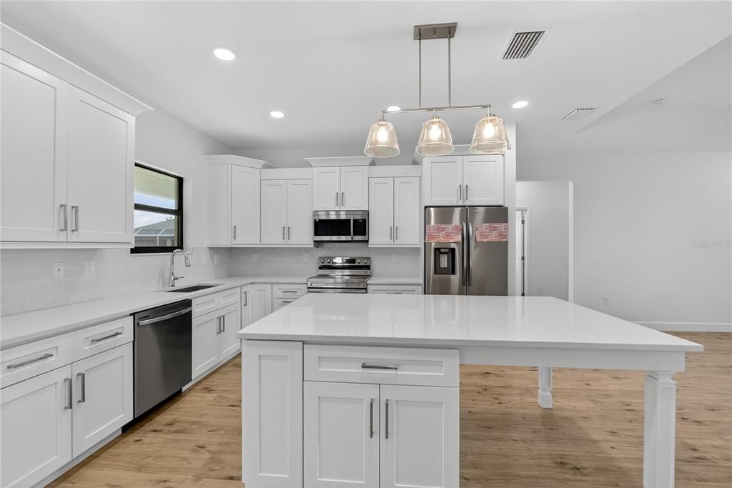 Interior, Kitchen, Pendant Lights, Recessed Lighting, Stainless Steel Appliances, Wood Texture Flooring