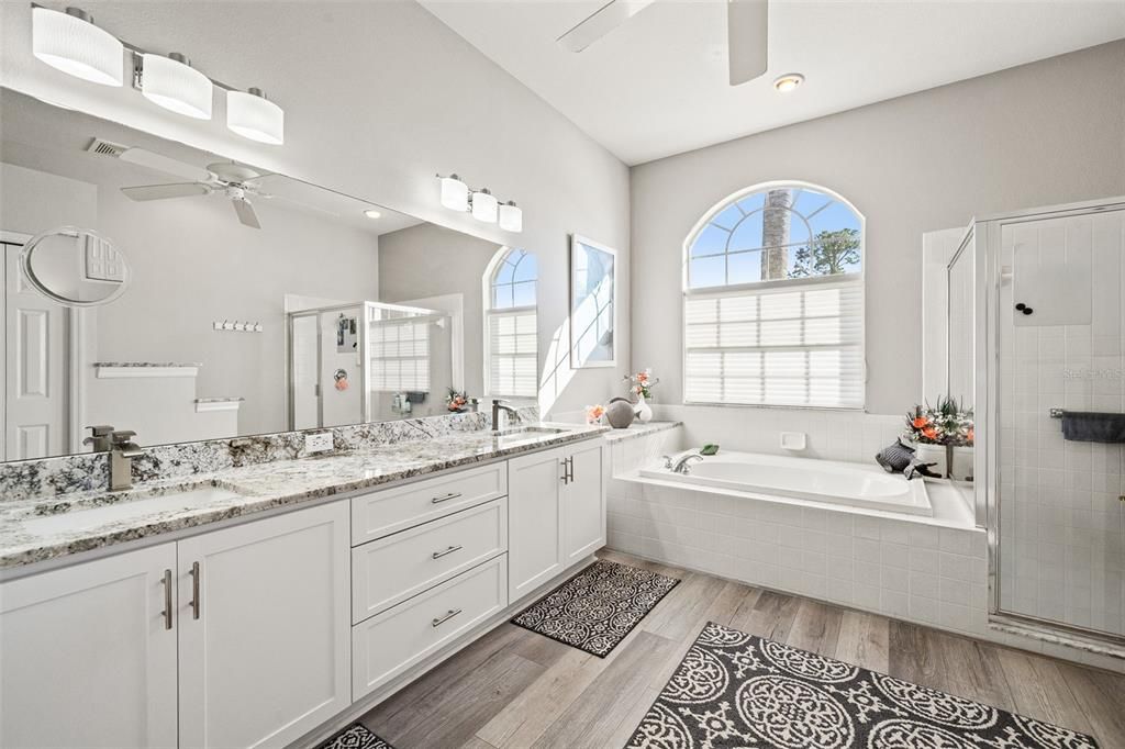 Bathroom, Dual Sink Vanities, Glass Shower, Interior, Recessed Lighting, Wood Texture Flooring