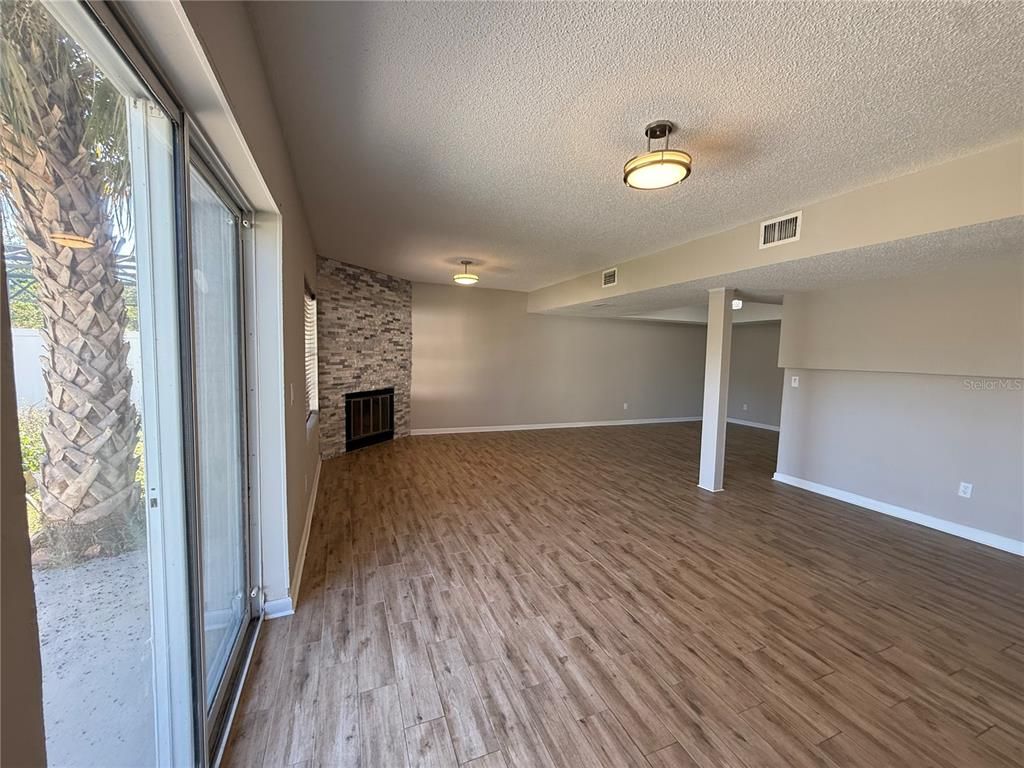 Empty room, Fireplace, Interior, Stone Walls, Wood Texture Flooring