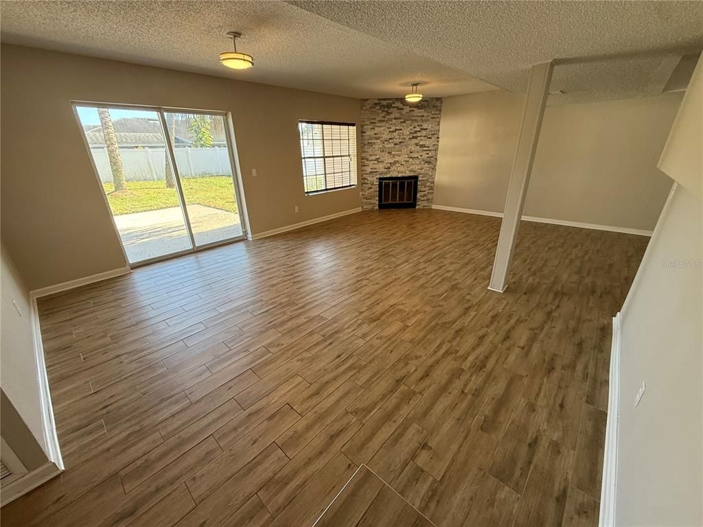 Empty room, Fireplace, Interior, Stone Walls, Wood Texture Flooring