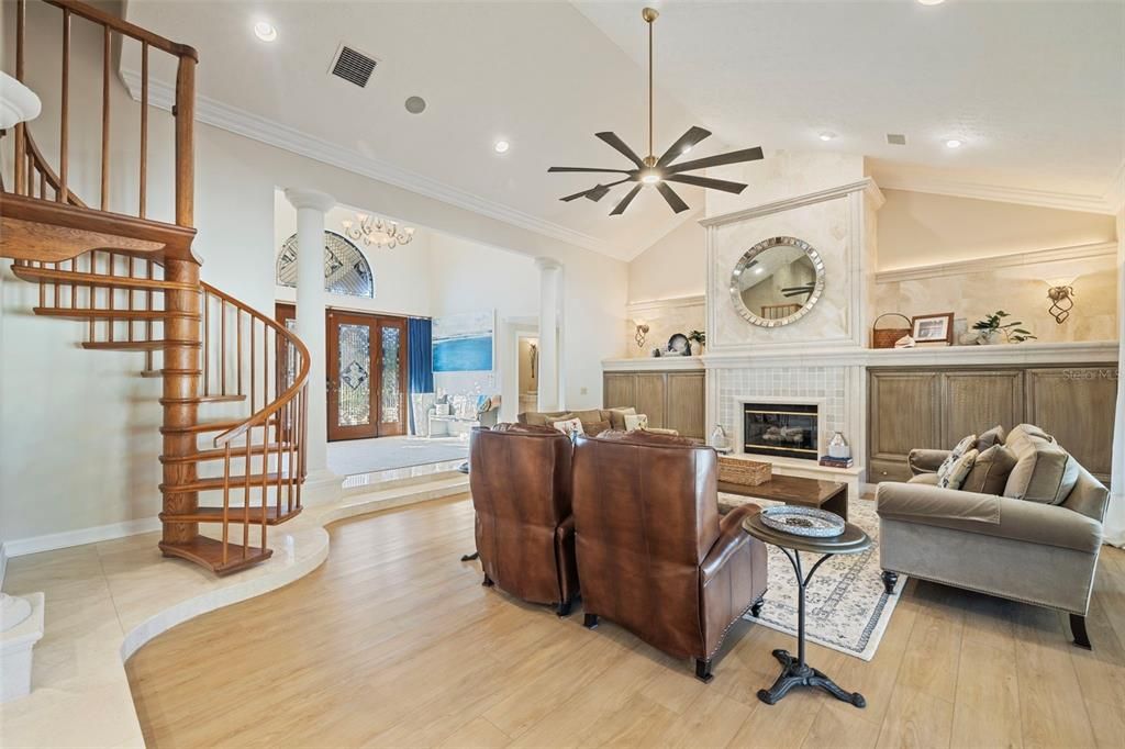 Chandelier, Fireplace, Interior, Living room, Recessed Lighting, Wood Texture Flooring