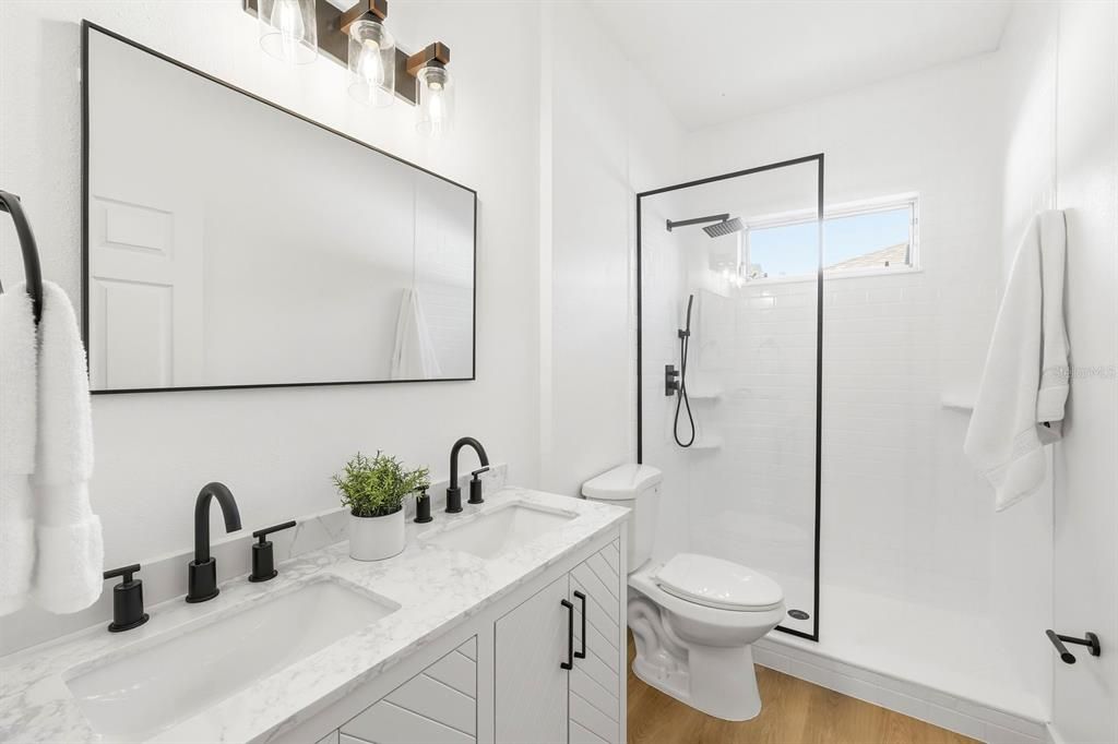Bathroom, Dual Sink Vanities, Glass Shower, Interior, Wood Texture Flooring