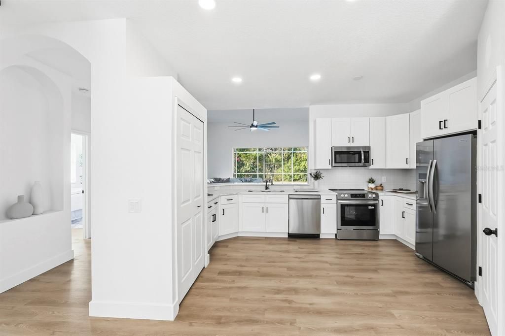 Interior, Kitchen, Recessed Lighting, Stainless Steel Appliances, Wood Texture Flooring