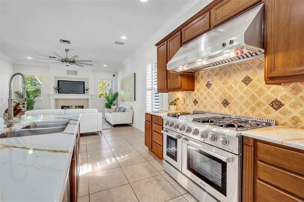 Fireplace, Interior, Kitchen, Recessed Lighting, Stainless Steel Appliances