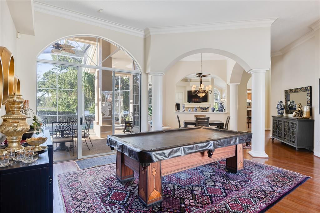 Billiard Table, Chandelier, Dining room, Game Room, Interior, Wood Texture Flooring