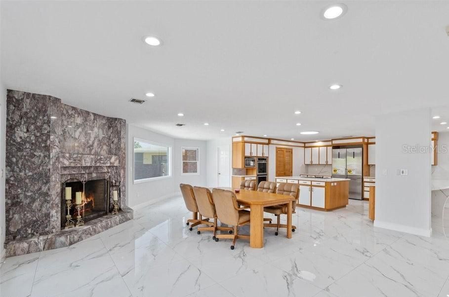 Dining room, Fireplace, Interior, Kitchen, Marble, Recessed Lighting, Stainless Steel Appliances