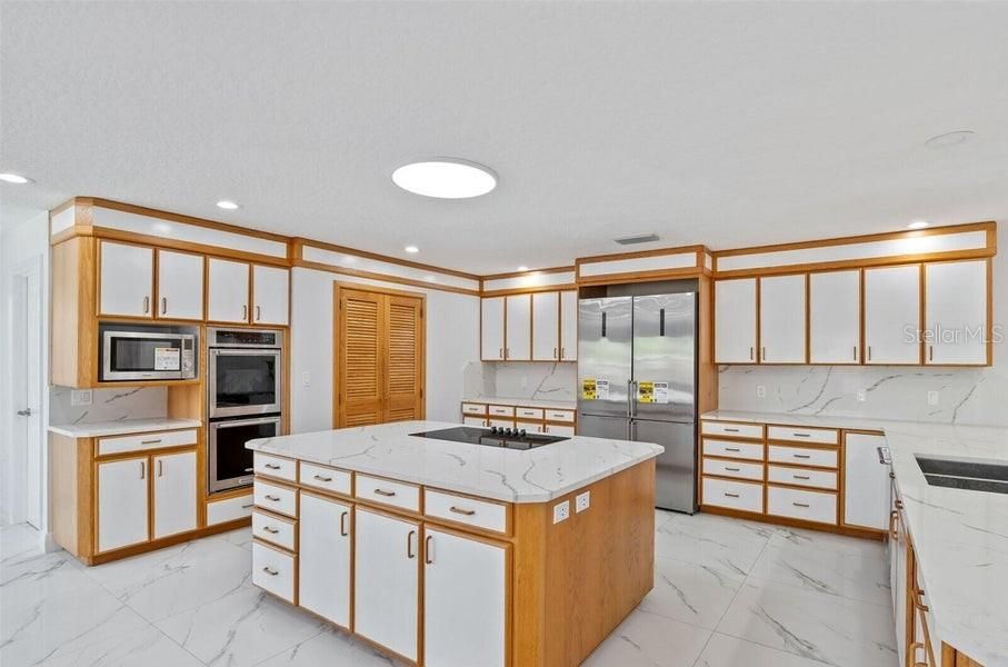 Interior, Kitchen, Marble, Marble Walls, Recessed Lighting, Stainless Steel Appliances