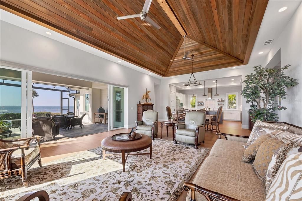 Dining room, Interior, Kitchen, Living room, Pendant Lights, Recessed Lighting, Water, Wooden Ceilings, Wood Texture Flooring