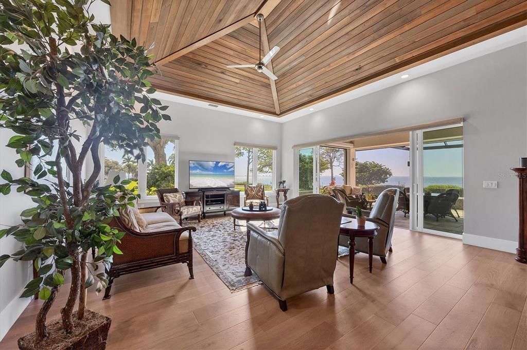 Dining room, Interior, Living room, Recessed Lighting, Water, Wooden Ceilings, Wood Texture Flooring