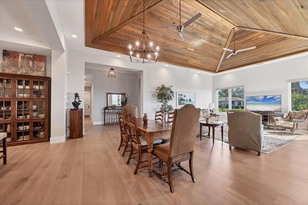 Chandelier, Dining room, Interior, Living room, Recessed Lighting, Wooden Ceilings, Wood Texture Flooring