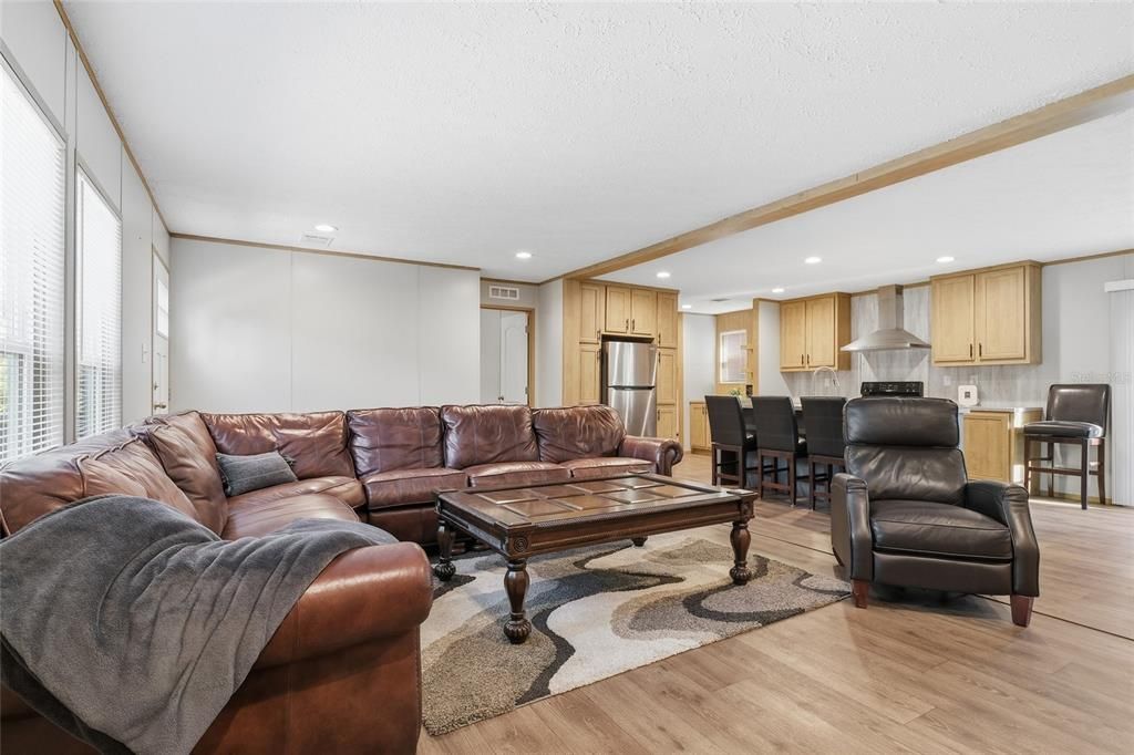 Dining room, Interior, Kitchen, Living room, Recessed Lighting, Stainless Steel Appliances, Wooden Beams, Wood Texture Flooring