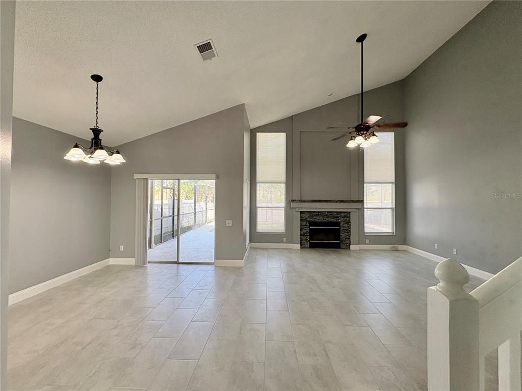 Empty room, Fireplace, Interior, Pendant Lights, Wood Texture Flooring