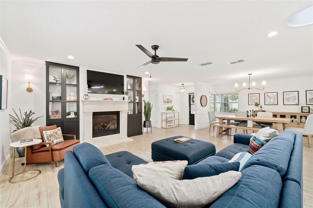 Dining room, Fireplace, Interior, Living room, Pendant Lights, Recessed Lighting, Wood Texture Flooring