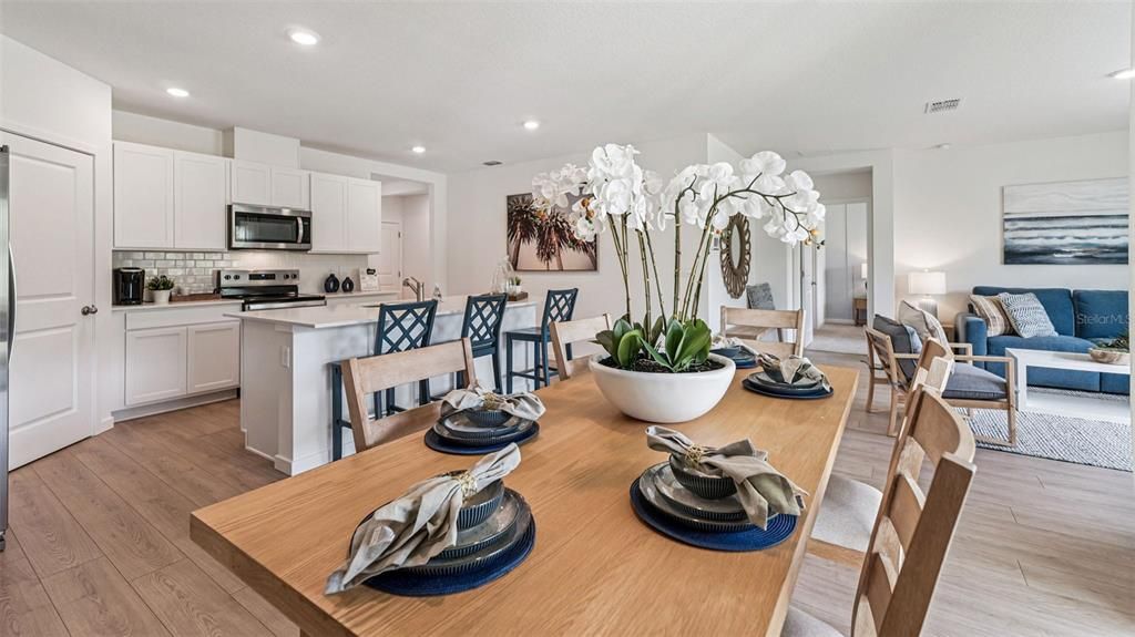 Dining room, Interior, Kitchen, Living room, Recessed Lighting, Stainless Steel Appliances, Wood Texture Flooring