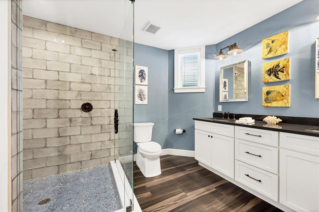 Bathroom, Glass Shower, Interior, Stone Walls, Wood Texture Flooring