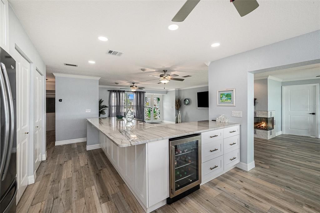 Fireplace, Interior, Kitchen, Recessed Lighting, Wood Texture Flooring