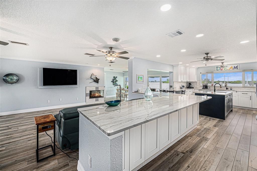 Fireplace, Interior, Kitchen, Recessed Lighting, Wood Texture Flooring